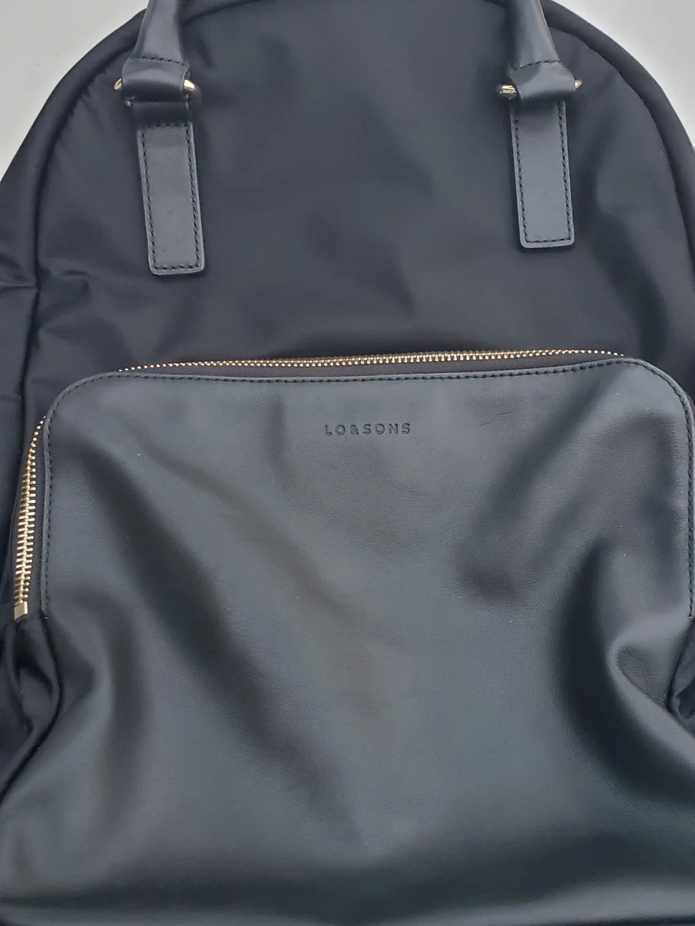 Lo & Sons Black Backpack with Gold Zipper Accents